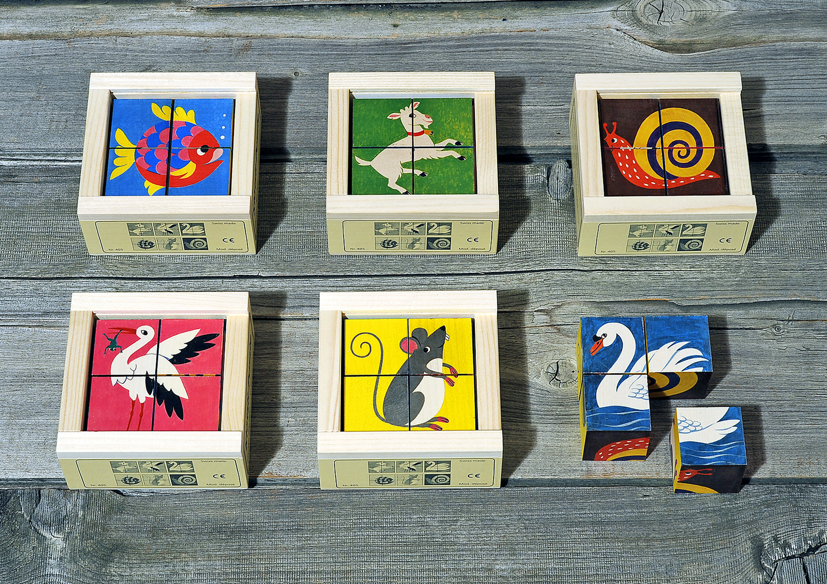 Klötzlipuzzle 4-teilig, Haustiere mit Farbhintergrund